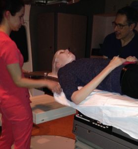 ABR Software Developer Casey Baker wears a protective mask as he undergoes radiation therapy in 2017.