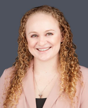 Headshot of Athena Loiacono.